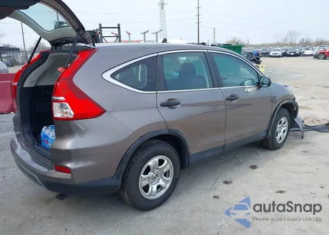 2015 Honda Cr-V Lx z USA, uszkodzony, nr VIN 5J6RM4H34FL051679